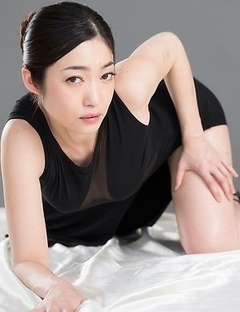 Dress-wearing classy seductress Ryu Enami using her feet to get this dude to cum