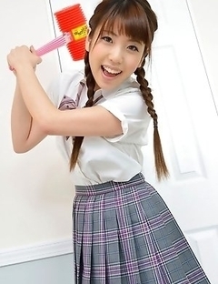 Mizuho Shiraishi with uniform and pigtails plays like child