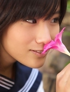 Japan teen Yuzuki Hashimoto in sailor gal uniform is playful outdoor