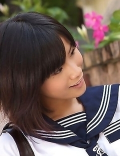 Japan teen Yuzuki Hashimoto in sailor gal uniform is playful outdoor