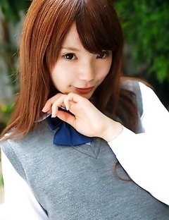 Manami Sato in short uniform skirt spends time in the park