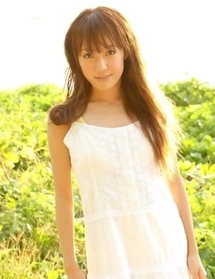 Nozomi Kawasaki in yellow bath suit enjoys the sun and sea