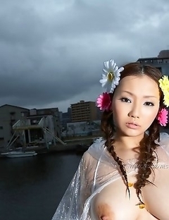 Desirable Japanese lass Rika Aiuchi poses in the bedroom