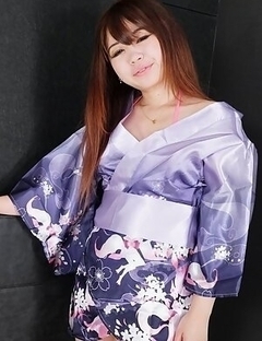 Baby sitter Megumi Shinozaki wearing a cute kimono