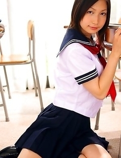 Kaori Ishii is naughty and shows legs under uniform skirt