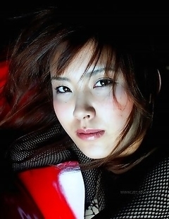 Remi and her sparkling red hairs in the outdoor photoset