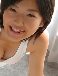 Noriko Kijima with huge knockers loves sun on her skin