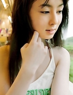 Rina Akiyama with sexy lips rubs her cunt of bar outdoor