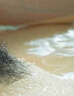 Ruru Anoa with big cans shows hot behind under shower