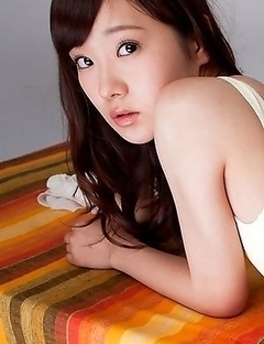Kana Yuuki in white bath suit moves with grace and passion
