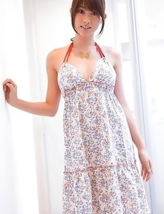 Mikie Hara with big tits and sexy legs listens to the music