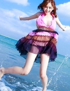 Anri Sugihara shows big melons while playing in water