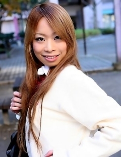 Remika Uehara poses on the street