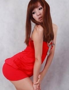 Sandy on heels shows hot behind in red dress for pictures