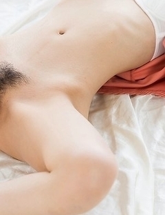 Rio Kamimoto shows her long legs and her welcoming pussy while on all fours