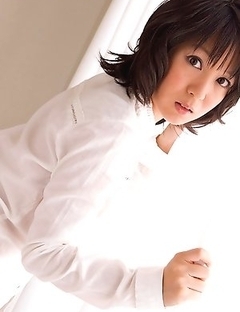 Nana Nanaumi shows hot behind and takes long socks off