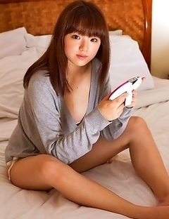 Ai Shinozaki with huge knockers plays with pillows in bed