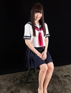 Schoolgirl seductress Aino Neko casually jerking a cock with her soft feet