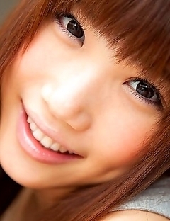 Juicy lady Honami Uehara is baring her beautiful breasts